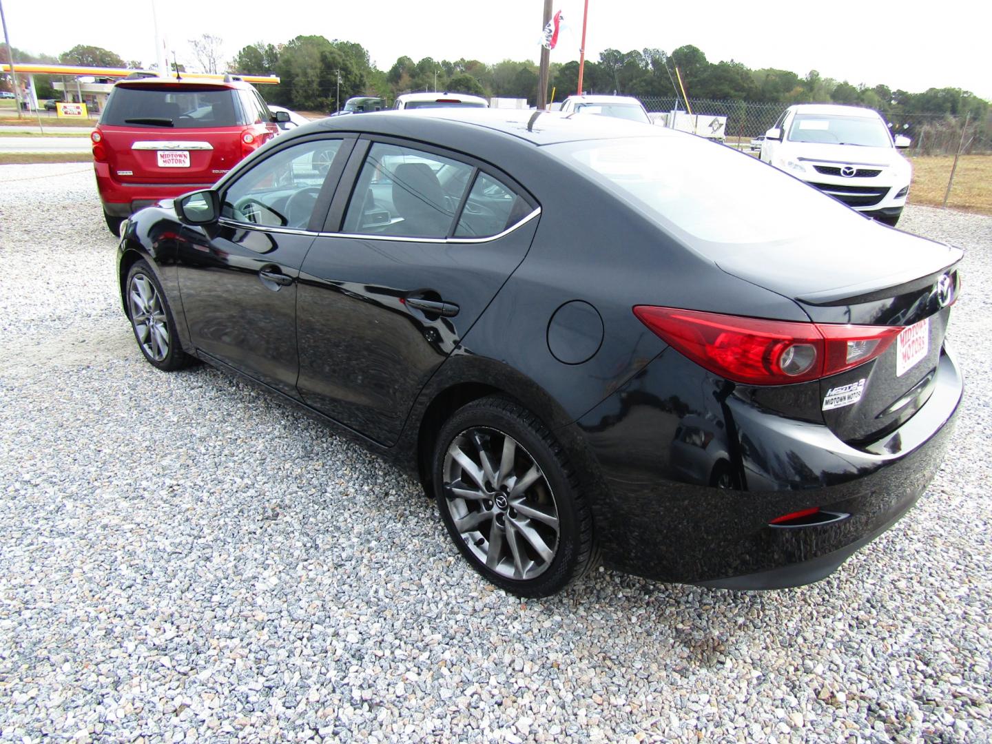 2018 Black /Black Mazda MAZDA3 s Touring AT 4-Door (3MZBN1V30JM) with an 2.5L L4 DOHC 16V engine, Automatic transmission, located at 15016 S Hwy 231, Midland City, AL, 36350, (334) 983-3001, 31.306210, -85.495277 - Photo#5